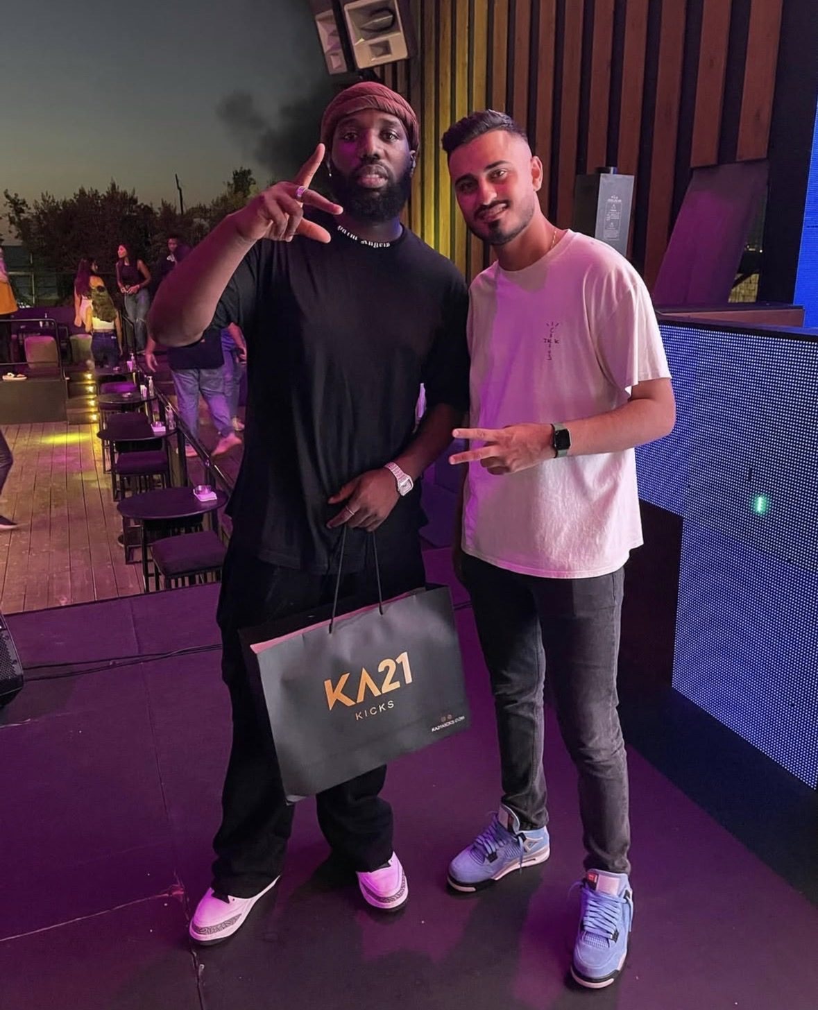 Kevin Aoun with Vegedream holding a KA21 Kicks bag
